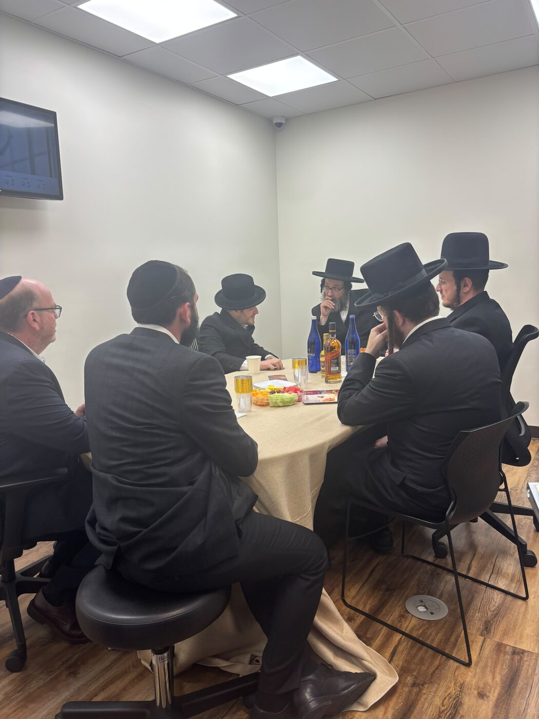 Community and healthcare leaders in a working roundtable