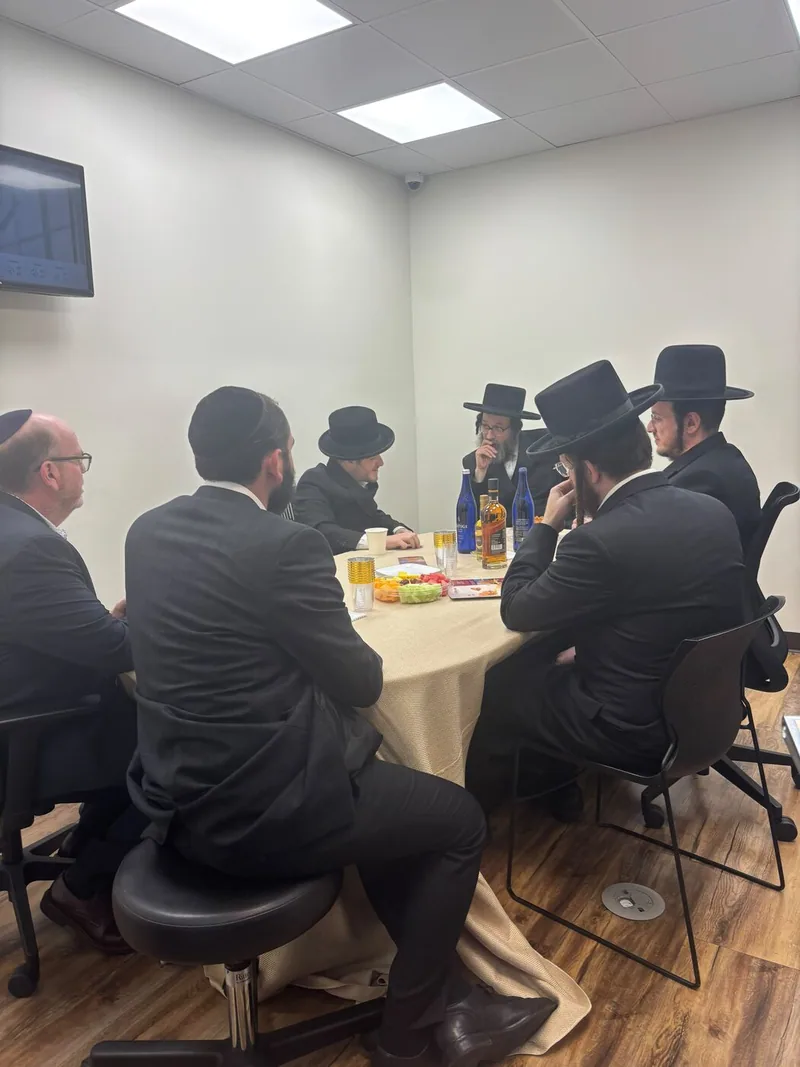 Community and healthcare leaders in a working roundtable