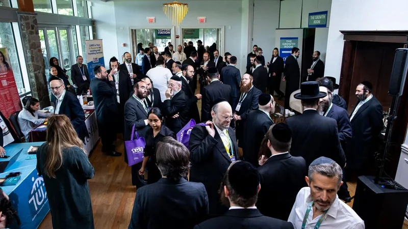Professionals connecting at the 2025 Neshumah Conference
