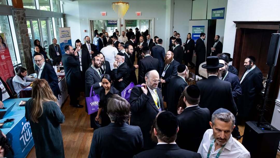 Professionals connecting at the 2025 Neshumah Conference
