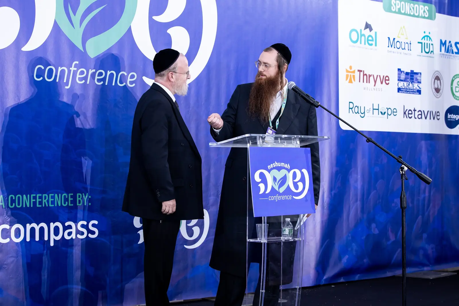 A Neshumah 2025 conversation, with Thryve visible on the sponsor display