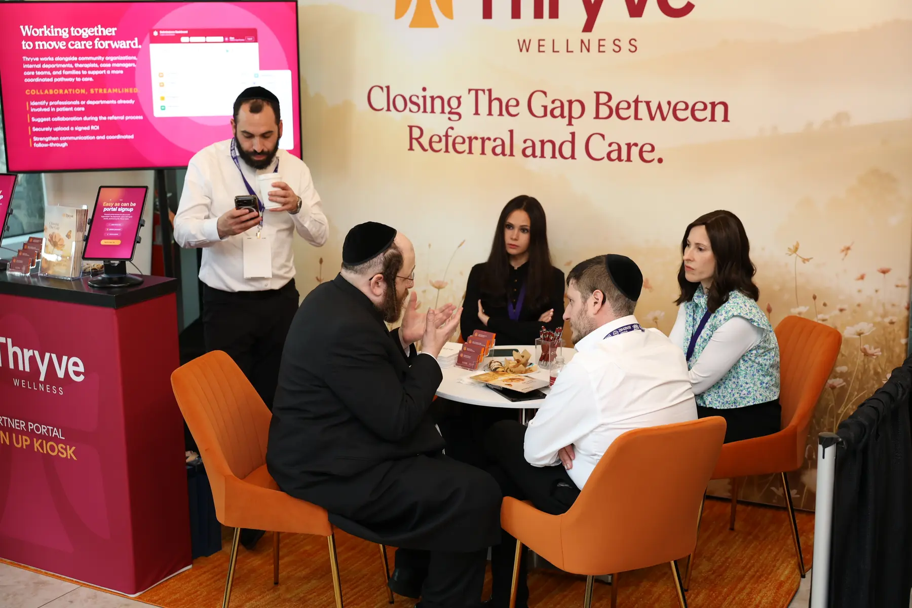 Visitors speaking at Thryve’s conference space
