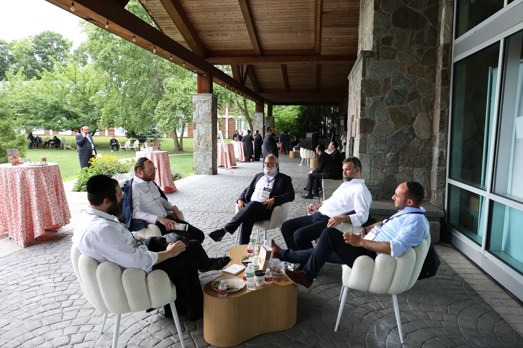 Professionals connecting in the Thryve Networking Garden at Neshumah 2026