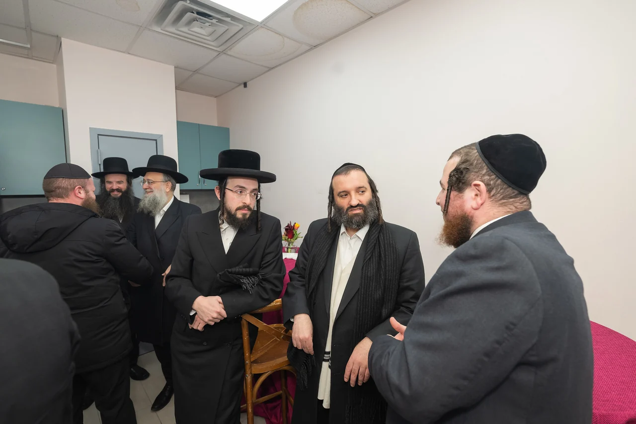 Guests in conversation during the Williamsburg opening.
